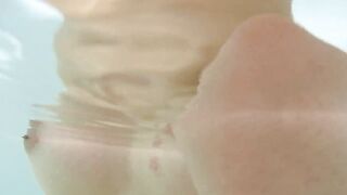 2 young Japanese girls bathing toghether