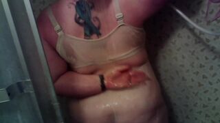 Dressed BBW Taking A Shower