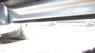 Frangelica Piss' into a Parking Lot during the Day and