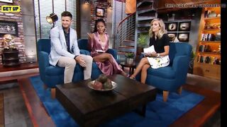 Ebony sports reporter shows a lot of leg