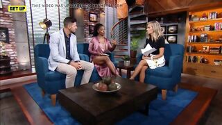 Ebony sports reporter shows a lot of leg