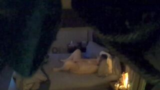 Woman alone in bed masturbating caught on hidden camera.