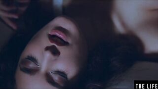 Rubbing her big puffy nipples as she fucks herself with