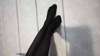 Stretching Beauty Legs and Foot inside African Tights Lying on the Bed
