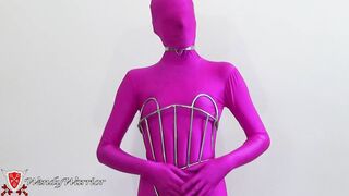 My Iron Maiden Corset is Locked over a Pink Zentai