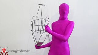 My Iron Maiden Corset is Locked over a Pink Zentai