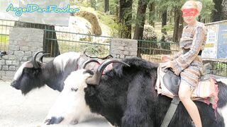 Angel Fowler having Fun Sitting on Yak