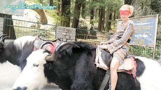 Angel Fowler having Fun Sitting on Yak