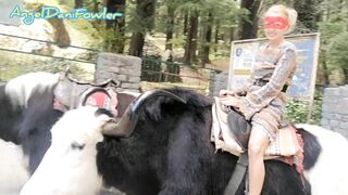 Angel Fowler having Fun Sitting on Yak