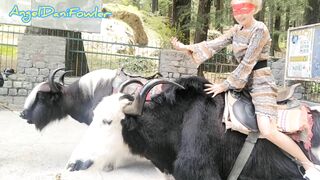 Angel Fowler having Fun Sitting on Yak