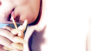 Blowing on a Lollipop while Watching TV Nude. (A Request)