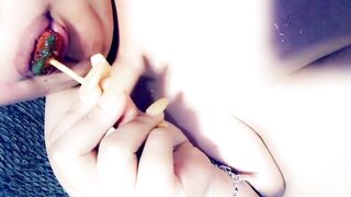 Blowing on a Lollipop while Watching TV Nude. (A Request)