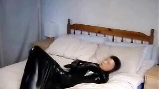 Adorable cunt with mouth into Ebony Rubber Catsuit with Mask makes self Bdsm inside