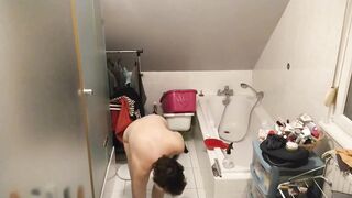 french older in the bathroom
