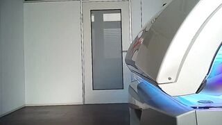 Stunning dark haired tanning part 1