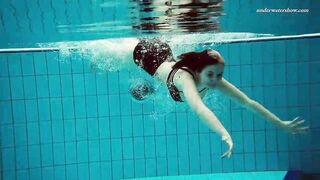 Huge boobs dark haired Bombshell Dashka swimming underwater