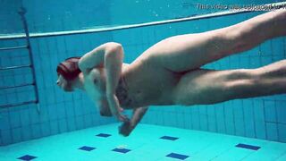 Huge boobs dark haired Bombshell Dashka swimming underwater