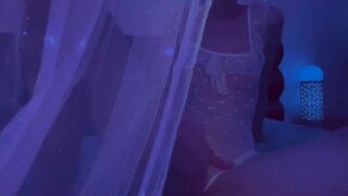 See this Babe chick through a Sheer Curtain as she Warms up