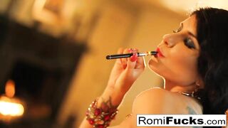 Smoking Bombshell Romi takes care of her soak cunt