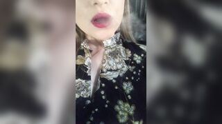 women inside a Dress Smokes Sexually