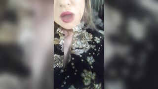 women inside a Dress Smokes Sexually