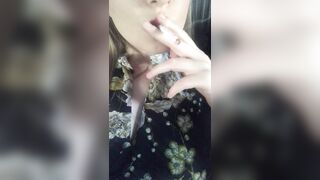 women inside a Dress Smokes Sexually