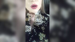women inside a Dress Smokes Sexually