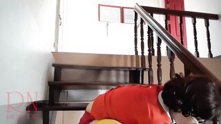 Velma Yellow Tights Performing into older House at Stairway