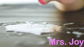 Cleaning up HIs Cum by Licking it off the Floor like a