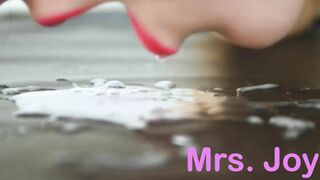 Cleaning up HIs Cum by Licking it off the Floor like a