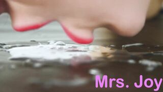 Cleaning up HIs Cum by Licking it off the Floor like a