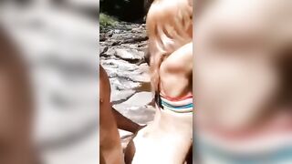 Cutie cougar taking Huge Puerto Rican Penis under Waterfall