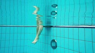 Huge melons slender goddess Deniska swimming inside the pool