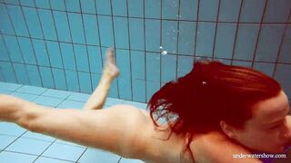 Huge melons slender goddess Deniska swimming inside the pool