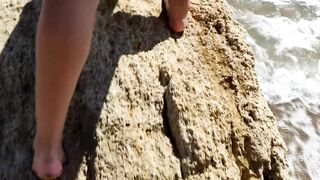 Alice is relaxing on the Sea on a Wild Beach with a