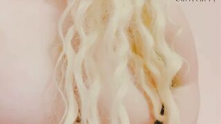 Blonde Smoking and taking Top off Slowly