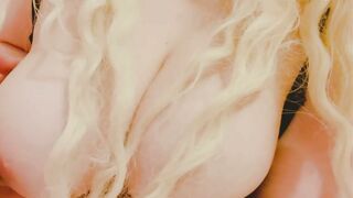 Blonde Smoking and taking Top off Slowly