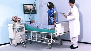 Nurse Checks Patient's Vitals