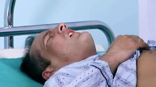 Nurse Checks Patient's Vitals