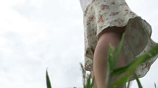 Camera look up Skirt into the Park. Close up under Skirt. Sweet
