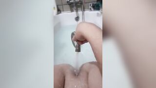Stuffing a Open Shower Hose inside my Cunt