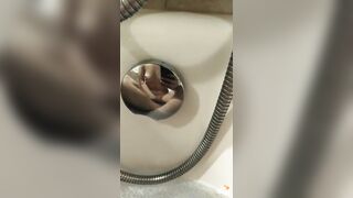 Incredible body and she fingering her vagina in the restroom