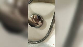 Incredible body and she fingering her vagina in the restroom