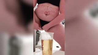bimbos Sips and Pours her Piss on herself