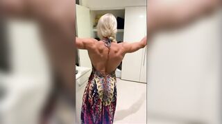 Amazingly beauty Blonde Lifts Dress Flexes Muscle Bums