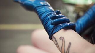 Fitting of Blue Rubber Gloves