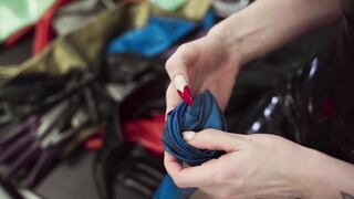 Fitting of Blue Rubber Gloves