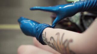 Fitting of Blue Rubber Gloves