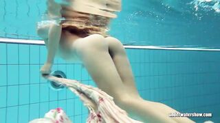 Beautifully clothed underwater Bombshell Lucy Gurchenko