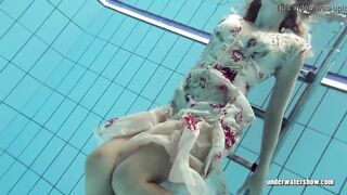 Beautifully clothed underwater Bombshell Lucy Gurchenko